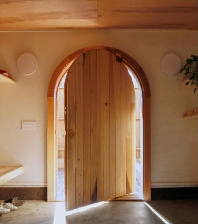 Custom Front Door Arched Alder Planks Design